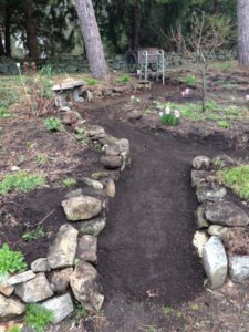 Finished Rock Retaining Wall in Circle Garden