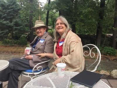 Jeanne Maurand of Hamilton and her father, Bob Yntema of Ipswich, relax in the garden at Rest.Stop.Ranch in Topsfield, MA.
