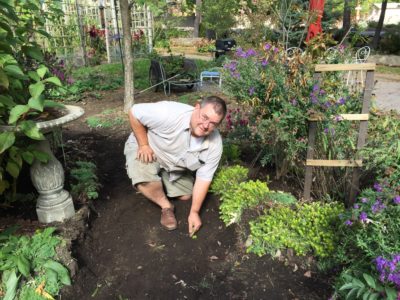 Karl Transplants Groundcovers to New Trail