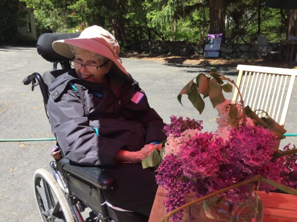 Eileen Dougherty from Gloucester Enjoys the Lilacs