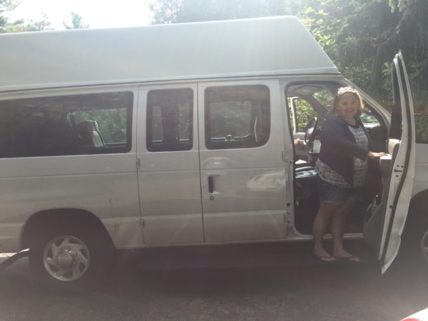 Abi Steps Out of the Chair Van