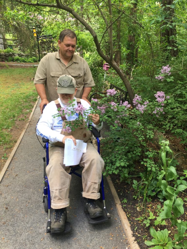 Karl and John Smell the Lilacs