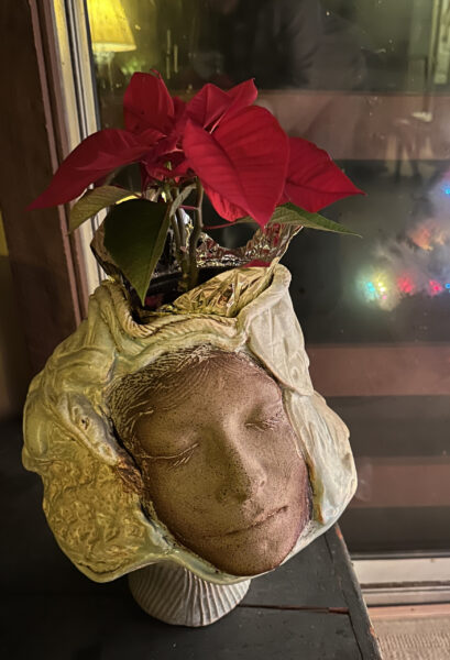 Inside the Caretaker's Cottage, Poinsettia Plant with Resting Caregiver Pottery