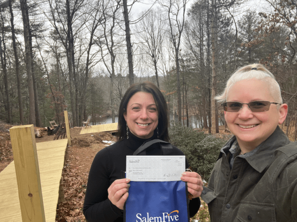 Courtney Wilton, SalemFive Bank, with Mary E MacDonald, Rest-Stop-Ranch; at the project site: Forest Flowers Trail
