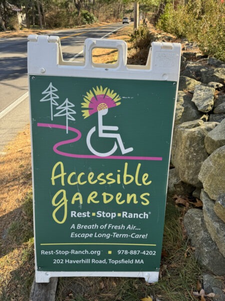 A frame street sign for Rest-Stop-Ranch